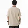 Camiseta de retazos a cuadros de color contrastante simple de manga corta para hombre y mujer, estilo nuevo de verano 2026, camiseta de media manga con cuello polo