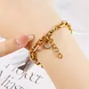 Europa y Estados Unidos estilo transfronterizo moda ins pulsera de acero de titanio todo partido estilo frío pulsera ovalada con forma de O de acero inoxidable 18K