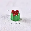 Novos acessórios decorativos de Natal com Papai Noel e boneco de neve, cenas de Natal em miniatura, meias de Natal, presentes, sinos e pequenas figuras de resina