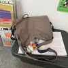 Bolso de lona casual estilo ins nuevo 2026, bandolera versátil unisex, bolso cruzado de gran capacidad moderno para estudiante