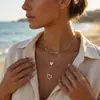 Nuevo collar de acero inoxidable de estilo europeo y americano transfronterizo que no se decolora, con modernos colgantes de corazón, hoja, cruz y cuentas