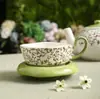 Juego de Té de Cerámica con Tazas, Platillos y Tetera para Uso Doméstico, Adecuado para Regalo, Serie de Rama y Vid de Cerámica con una Cesta Portátil
