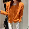 2026 Novo Cardigã de Tricô com Ponto Trançado de Botão Único Cardigã de Gola Redonda Estilo Coreano Fashionável Chique Cor Sólida Top Básico