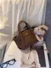 Bolsa de Mão de Nicho Elegante com Padrão de Lichia Bolsa Dumpling para Mulheres Novo Estilo 2025 Bolsa Saco Versátil Bolsa Transversal Bolsa Cesta