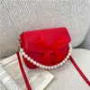 Bolsa Pequena de Corrente de Pérola 2026 Novo Modelo Tendência Moda Bolsa de Ombro Textura Casual Bolsa Transversal com Laço