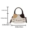 Bolso de mano cruzado de un solo hombro con bloques de color, lindo y adorable, para niña, moda nueva primavera 2026, versátil, con estampado de gato de dibujos animados, elegante