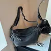Bolsa de Hombro Cruzada 2026 Nueva Casual Relajada Vintage Nicho Mezclilla Forma de Dumpling para Mujeres Bolso Cruzado para Viajes