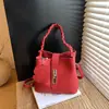 Bolso de Mano Informal de Moda Nicho Estilo Coreano Transfronterizo para Mujer Modelo Nuevo Primavera 2026 Bolso Cubo de Hombro Cruzado