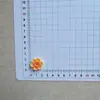 Accesorios mayoristas de pétalos brillantes y coloridos de flor de cerezo y flor de durazno para manualidades DIY, diademas infantiles, ropa, fundas de teléfono, zuecos y bolsos