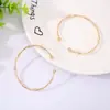 Pulsera Abierta de Estilo Europeo y Americano Transfronteriza Sencilla Versátil Sentido de Alta Gama Pulsera Estilo Frío Ins Anillo de Mano con Patrón de Ola de Moda