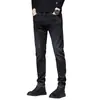 Jeans masculinos slim-fit pretos e cinzas de alta qualidade para o Outono/Inverno 2026, calças compridas casuais trendy e elásticas com forro de fleece