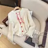 Cardigan de Tricô Estilo Coreano Celebridade Estilo Doce com Laço Feminino Outono e Inverno Novo Design com Borda de Orelha Botão de Coração Suéter