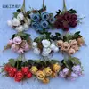 Simulación de 7 cabezas rosa perla fotos de boda sosteniendo ramo flores artificiales decoración de fotos retro sosteniendo flores comercio exterior flores de seda