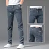 Jeans Masculino de Cintura Alta Reto Solto 2026 Slim Fit Lavado Stretch Casual Calça Longa Masculina Novo Estilo Primavera e Outono
