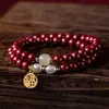 Muzhihui Venta al por mayor Pulsera de doble círculo de cinabrio de alto contenido Pulsera con colgante de la fortuna de arena púrpura y oro Jade Hetian Perla