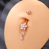 Anillo de ombligo de flor de venta caliente europea y americana, cobre incrustado de circón, acero inoxidable, clavo de ombligo perforado, joyería para piercing corporal Amazon