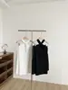 Otoño 2026 Nuevo Estilo Coreano Ins Retro Chica Picante Nicho Holgado Versátil Camiseta de Manga Larga con Cuello Halter Top para Mujer Tendencia
