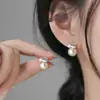 Pendientes de aro minimalistas con un diseño único, pendientes de nicho de plata de ley para mujer, lujo ligero con un toque de alta gama, pendientes de botón de perla, pendientes largos de borla