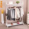 Perchero simple estante para exhibir ropa perchero colgante para ropa de mujer de pie para dormitorio estante simple para bolsas de almacenamiento doméstico