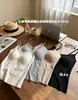 Camisola ajustada para mujer con copas fijas integradas y sujetador acolchado, adecuada para usar en capas o como prenda exterior