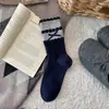 Calcetines de algodón para mujer con lazos para primavera y otoño, calcetines de media pantorrilla estilo universitario ins japonés, calcetines de algodón con parte superior de burbuja para otoño e invierno para niñas