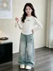 Nova coleção de outono: Calça jeans larga bordada em estilo cartoon para meninas, de corte solto, fluida e comprida, um estilo casual e moderno para crianças mais velhas