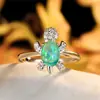 Anillo de tortuga colorido de platino y diamante azul más vendido transfronterizo moda para hombres y mujeres anillo simple una generación de venta al por mayor
