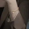 Pulsera de Trébol de Cuatro Hojas de Oro Roto para Mujer Nueva Entrada Lujo Ligero Nicho Pulsera Exquisita Sentido de Diseño de Nicho Regalos para Novias