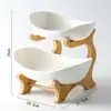 Plato de frutas creativo de doble capa multicapa estilo europeo de cerámica para frutas secas con soporte de bambú plato de sushi para el hogar cesta de frutas directo de fábrica