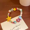 Pulsera con Borla y Colgante de Estrella Geométrica de Dopamina, Pulsera Fresca y Dulce, Lujo Ligero, Sensación de Alta Gama, Accesorio de Mano Versátil