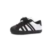 Zapatos de Skate para Niños 2026 Nuevo Otoño Zapatos Deportivos para Niños Suela Suave Antideslizantes Niños Medianos y Grandes Marca de Tendencia Zapatos de Entrenamiento Alemanes