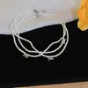 Colar de pérolas com laço multicamadas estilo francês, moderno e versátil para o dia a dia, corrente para clavícula com toque de luxo leve e sofisticado para mulheres