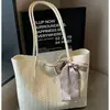 Bolso tote para mujer, nicho transfronterizo 2026 nuevo bolso tejido, bolso casual de gran capacidad para mujer, bolso de hombro estilo coreano