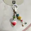 Llavero de Bolsa de Cerámica Tejida a Mano de Jingdezhen, Colgante Creativo de Anilla de Resorte, Venta al por Mayor de Pequeños Regalos Culturales y Creativos