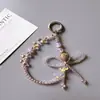 Cadena para Teléfono Móvil Llavero Colgante Pequeño Fresa de Cristal con Lazo Pulsera de Cuentas Colgante de Muñeca Moda para Mujer