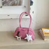 Bolso Boston exquisito súper popular transfronterizo para mujer, nuevo modelo 2026, bolso de axila versátil de lujo ligero de nicho de alta gama para el trabajo