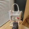 Bolso de mano estilo coreano transfronterizo, nuevo modelo 2026 para niñas, bolso tipo cubo simple, alto valor estético, bolso cruzado versátil