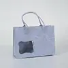 Bolsa de fieltro con overlock, bolso de fieltro con logotipo personalizado, negocio transfronterizo, fabricante de bolsas de fieltro para vacaciones