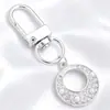 Lujo Ligero Chapado en Oro Full Diamante Charm Hebilla en Forma de D Colgante Hueco en Forma de Corazón Accesorios para Bolsos Llaves Fábrica Stock Mayorista
