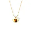 Estilo palacio retro verano temperamento total joyería incrustación geométrica diseño natural piedra ojo de tigre acero de titanio chapado en oro colgante