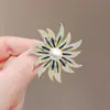 Broche único de perlas con diseño de corazón 2024 nueva moda otoño e invierno corsage accesorios de alfiler delicados para mujer Corea del Sur