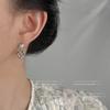Pendientes de amor hueco con viento frío, diseño de nicho para mujer, pendientes de nudo de agua alcalina, pendientes simples de perlas Joker, venta al por mayor