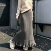 Saia Midi de Tricô Cauda de Peixe Feminina Outono/Inverno 2026 Cintura Alta Emagrecedora Elegante (Oca) Saia Longa Fluida Linha A