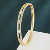 Exclusivamente para los mercados europeo y americano, Moda transfronteriza de alta gama, Pulsera hueca geométrica cuadrada con circonitas de colores y chapado en cobre, Venta directa del fabricante