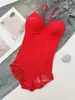 Ropa moldeadora de una pieza para mujer, ropa de escote en V profundo, tirantes de encaje tipo triángulo, soporte abdominal, almohadilla para el pecho, corsé de ropa interior transfronteriza europea y americana 634