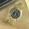 Banda de Acero Elástica al por Mayor No Impermeable Luminosa Reloj Elástico Reloj de Cuarzo para Personas de Mediana Edad y Mayores con Números Grandes Reloj de Pareja