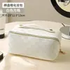 Bolsa cosmética impermeable de PU Portátil de mano Almacenamiento de suministros de maquillaje Cuadros de alto valor Bolsa de tocador de viaje para maquillaje