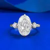 Mu Jing joyería nuevo S925 plata chapado en oro incrustado 8*12 ovalado corte flor de hielo diamante de alto carbono anillo venta caliente transfronteriza