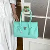Bolsa de Gelatina de Mano Bolso Tote Platino para Mujer 2026 Nuevo Estilo de Verano PVC Color Sólido Gran Capacidad Bolso de Hombro Versátil