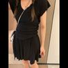Traje de Punto Otoño para Mujer Reducción de Edad 2025 Cuello V Escote Bajo Camiseta Manga Corta Falda Plisada Dos Piezas Traje Deportivo Chica Hot